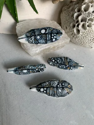 Blue and white hand painted ‘feather’ brooch, choose one