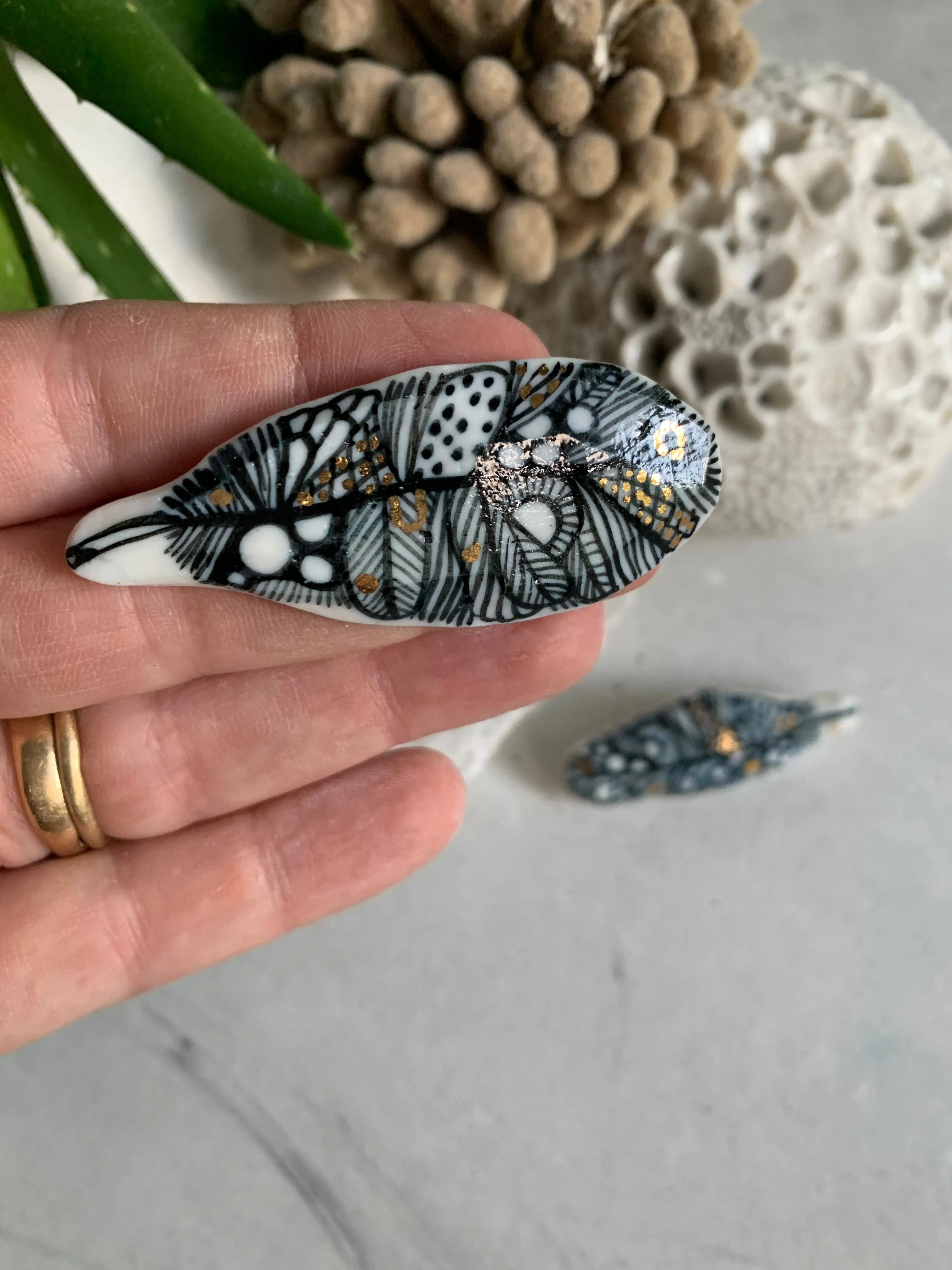 Blue and white hand painted ‘feather’ brooch, choose one